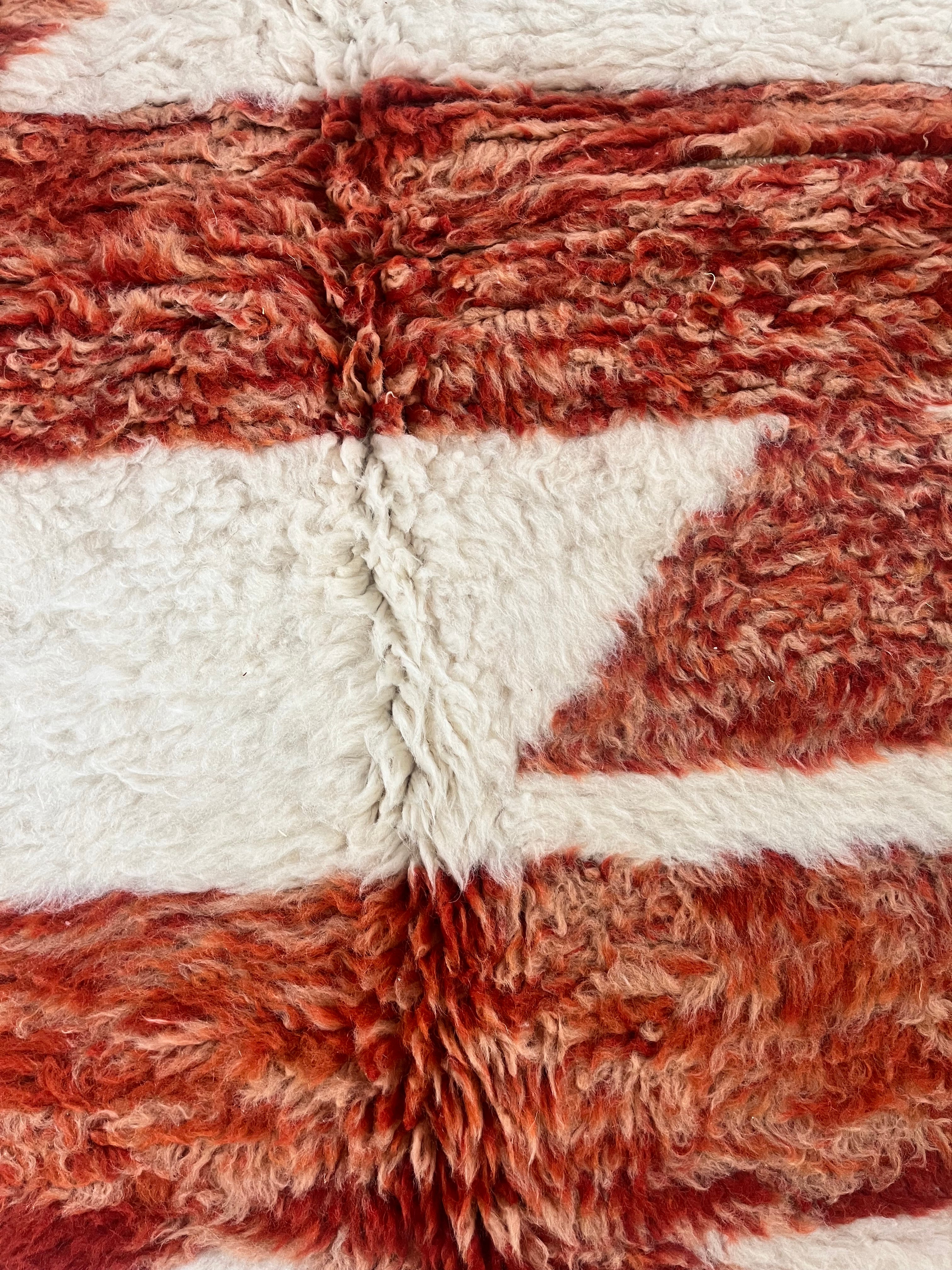 Nehal 5 x 8 Handwoven Beni Ourain Rug in Cream and Dark Orange.